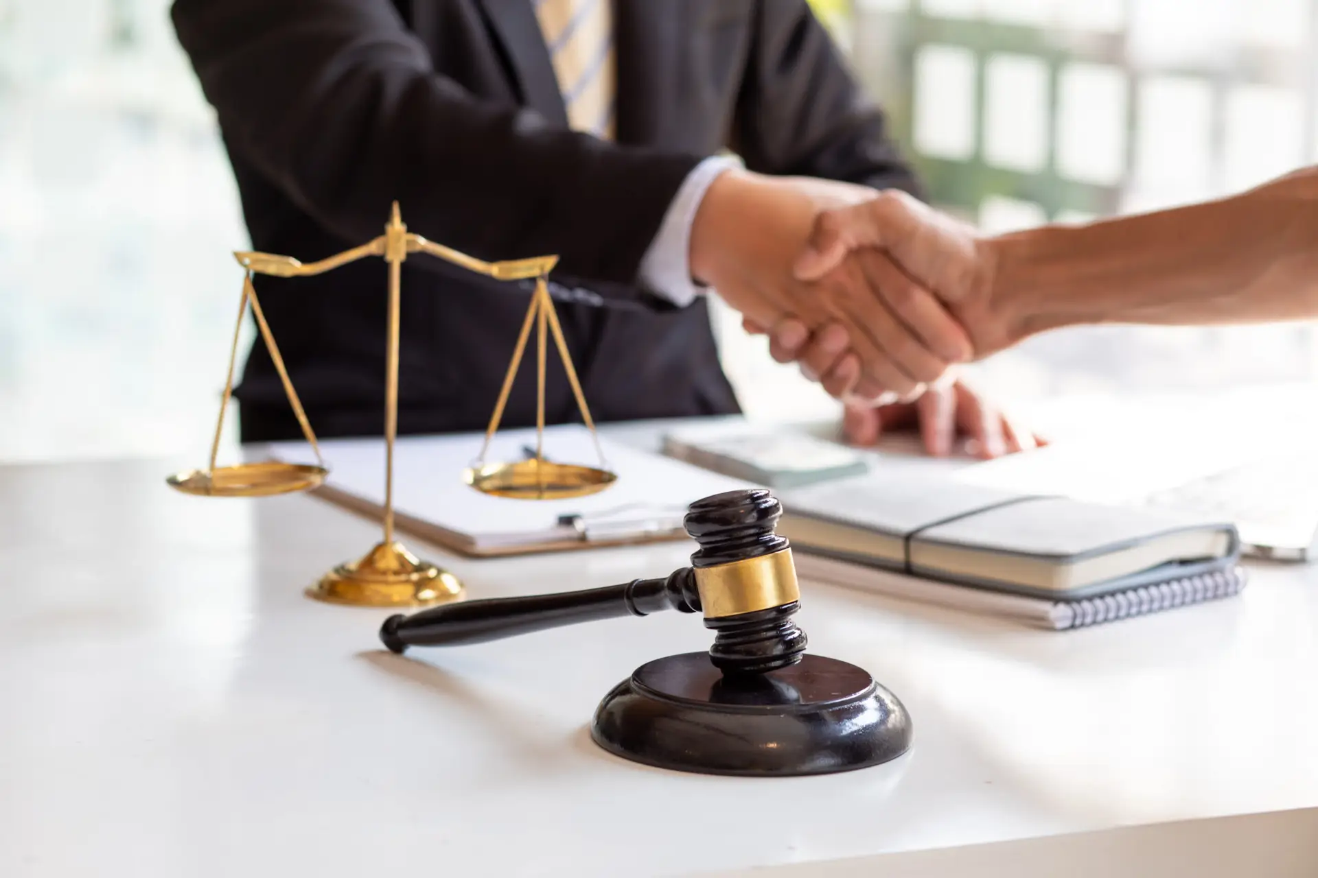 Client and Twin Falls child custody lawyer shaking hands.