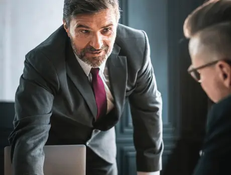 Lawyer talking with another lawyer about a case